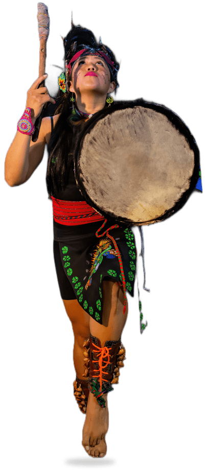 A Nakota dancer with a hand drum